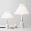Lyngby porcelæn Esben klint lampe, har har du 2 valgmuligheder, af denne Esben Klint lampen er en unik sammensætning af to danske designklassikere,