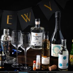 Champagnegin med glas og bobler