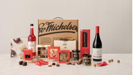 Sv.Michelsen sampakgave med Fairtrade chokolade 560, Stor gavekuffert med Fairtrade chokolade, saft & vin, flot sampak til en festlig sammenkomst.