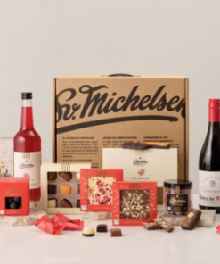 SV.Michelsen Fairtrade chokolade og vin 400, dejlig gavekuffert med Fairtrade chokolade & vin, som er et perfekt indsalg til de hyggelige juledage