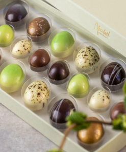 Xocolatl Golden eggs art 20, 20 fyldte chokolader med citron, lakrids, flødekaramel, saltkaramel, nougat, mint og hasselnøddekaramelCa. 184 gr