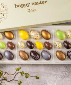 Xocolatl Golden eggs art 10, 10 fyldte chokolader med citron, lakrids, flødekaramel, saltkaramel, nougat, mint og hasselnøddekaramelCa. 92 gr.
