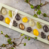 Xocolatl spring feeling 16, Grøn gaveæske med 16 fyldte chokolader. Smage som yuzu,lakrids, ,marcipan, flødekaramel, mint, citrusmix, saltkaramel, nougat