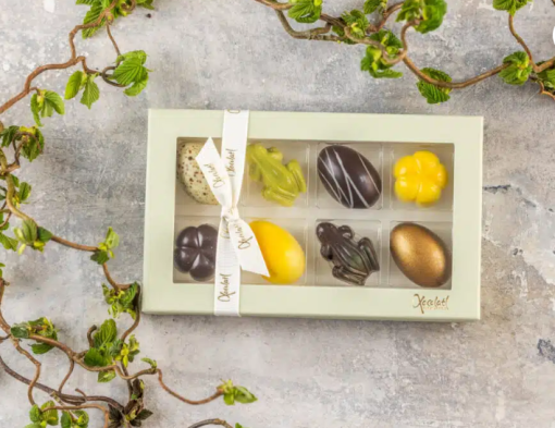 Xocolatl spring feeling 8, fyldte chokolader, smagsvarianter som lakrids, yuzu,marcipan, flødekaramel, mint, citrusmix, saltkaramel og nougat Ca. 94 gr.