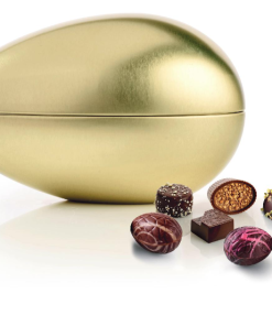Strudsæg i guld, flot æg flyd med lækker chokolade. 900 gr luksus chokolade marcipan og luksusæg. En flot gave at give eller modtage.