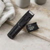 Nordic sense skægtrimmer, med sug hjælper med at holde håndvasken ren, mens du trimmer. Vakuumfunktion opsamler skægstubbe under brug og holder vasken ren.